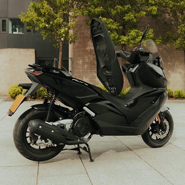 Aura 125 underseat storage compartment open