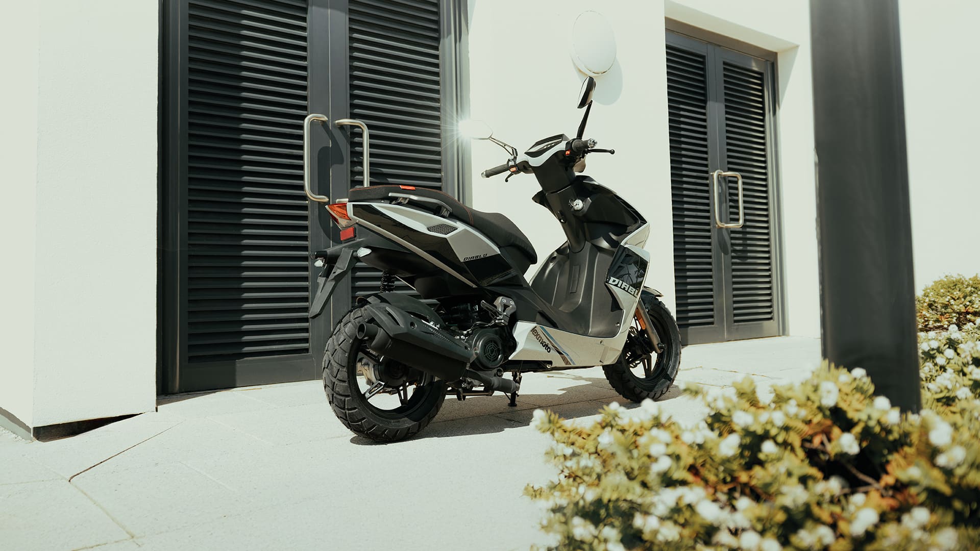 Diablo 50 rear three-quarter outside building showing exhaust and rear bodywork