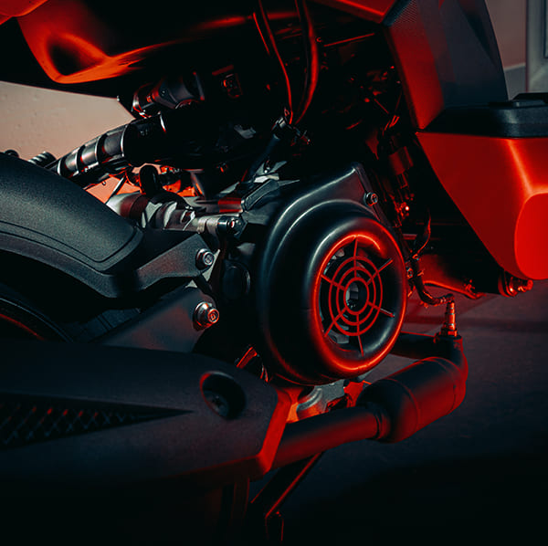 L5 engine fan and CVT cover close-up with red neon
