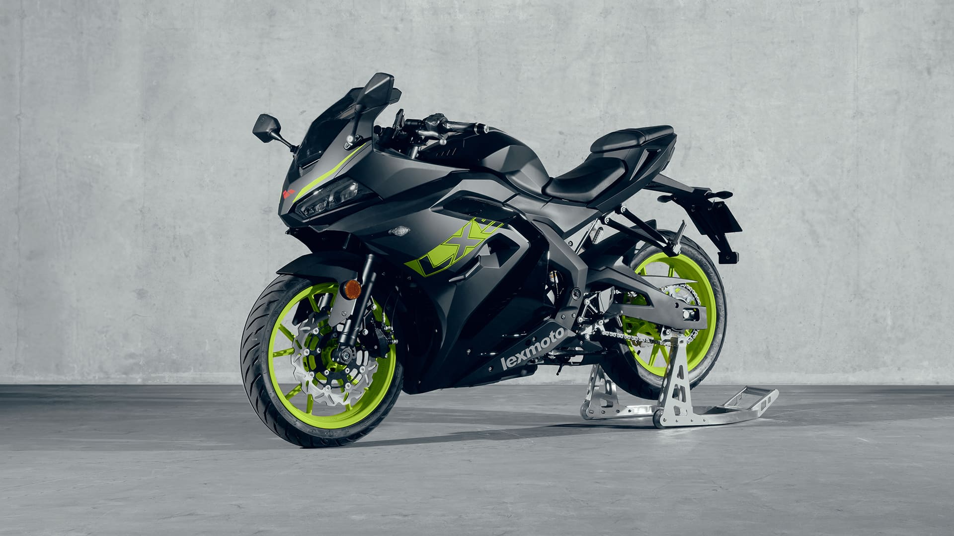 LXS 125 Black/Volt front three-quarter on paddock stand