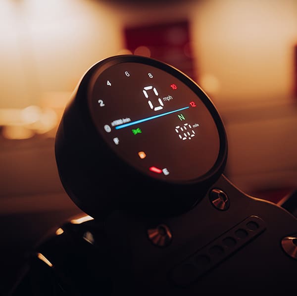 R66 round digital display showing speedo, tacho, and gear indicator