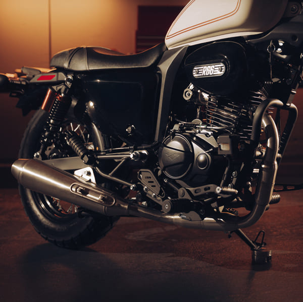 R66 stainless steel exhaust and engine close-up with R66 badge